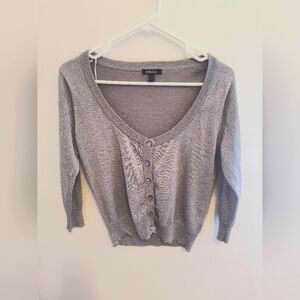 UK to LA silver top. Size Large. Color silver. Good condition